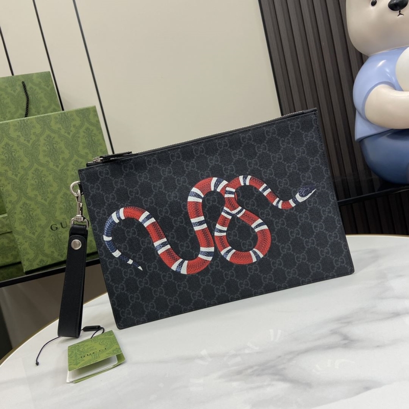 G*u*i clutch bags